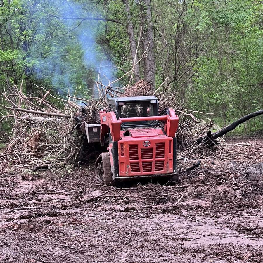 Clearing brush on a wooded lot in North Georgia